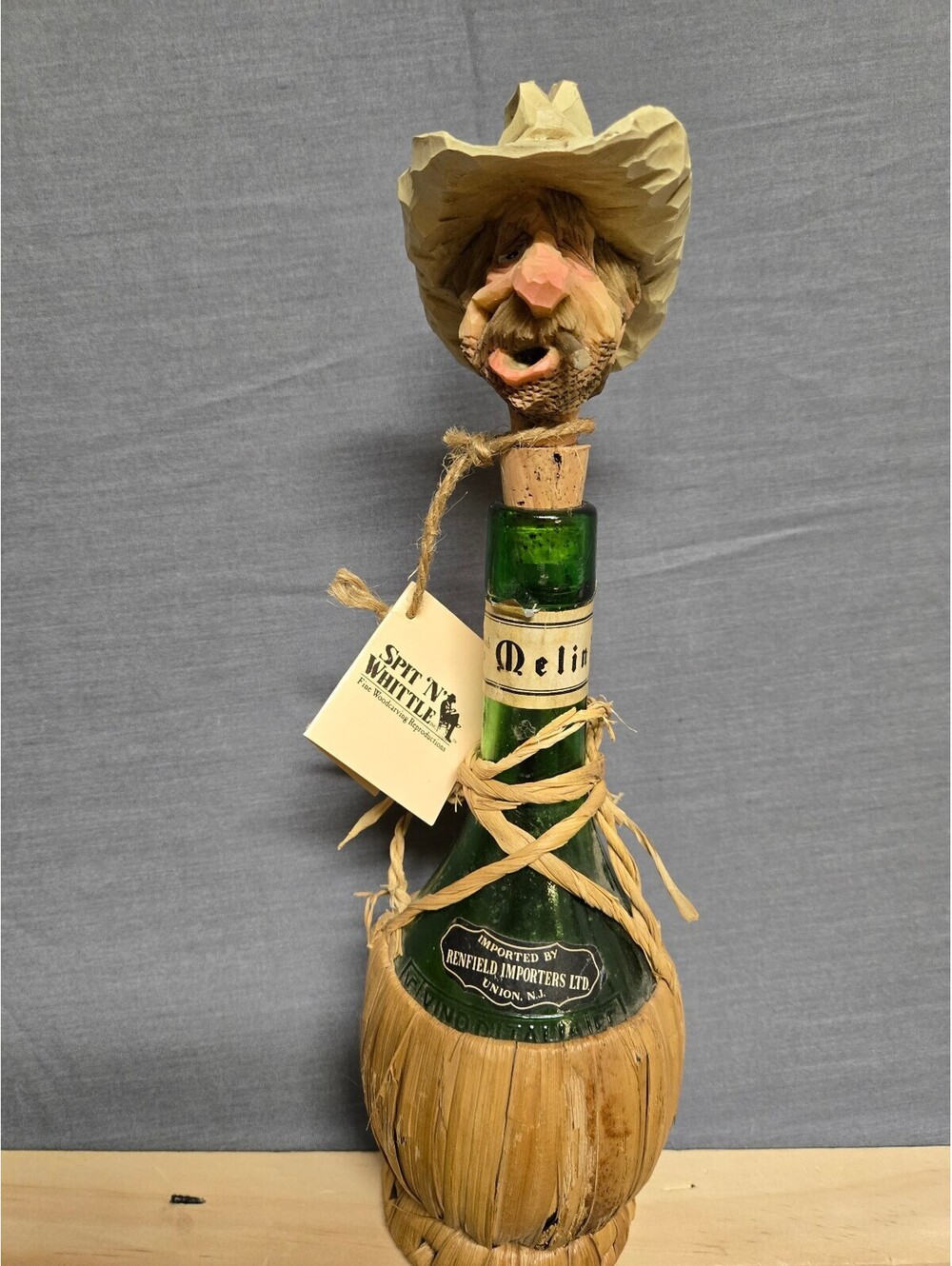 Spit N Whittle Hoolihan Hank carved wood bottle stopper figure on wine bottle